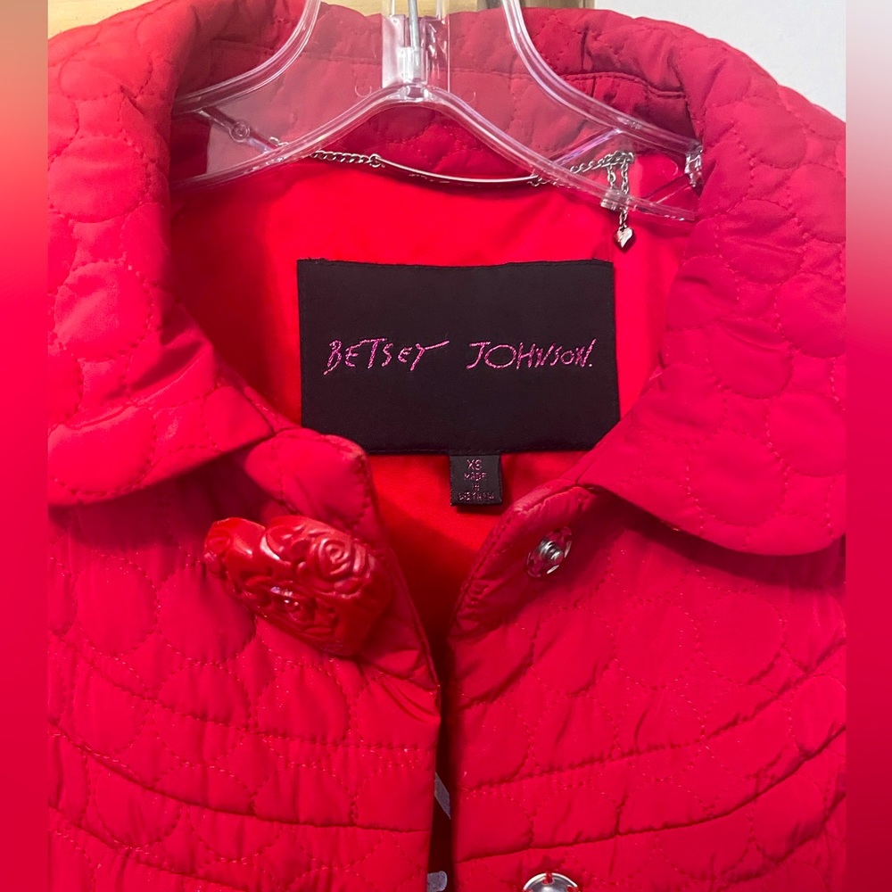 Betsey Johnson red quilted coat with signature heart button detail. Size: XS